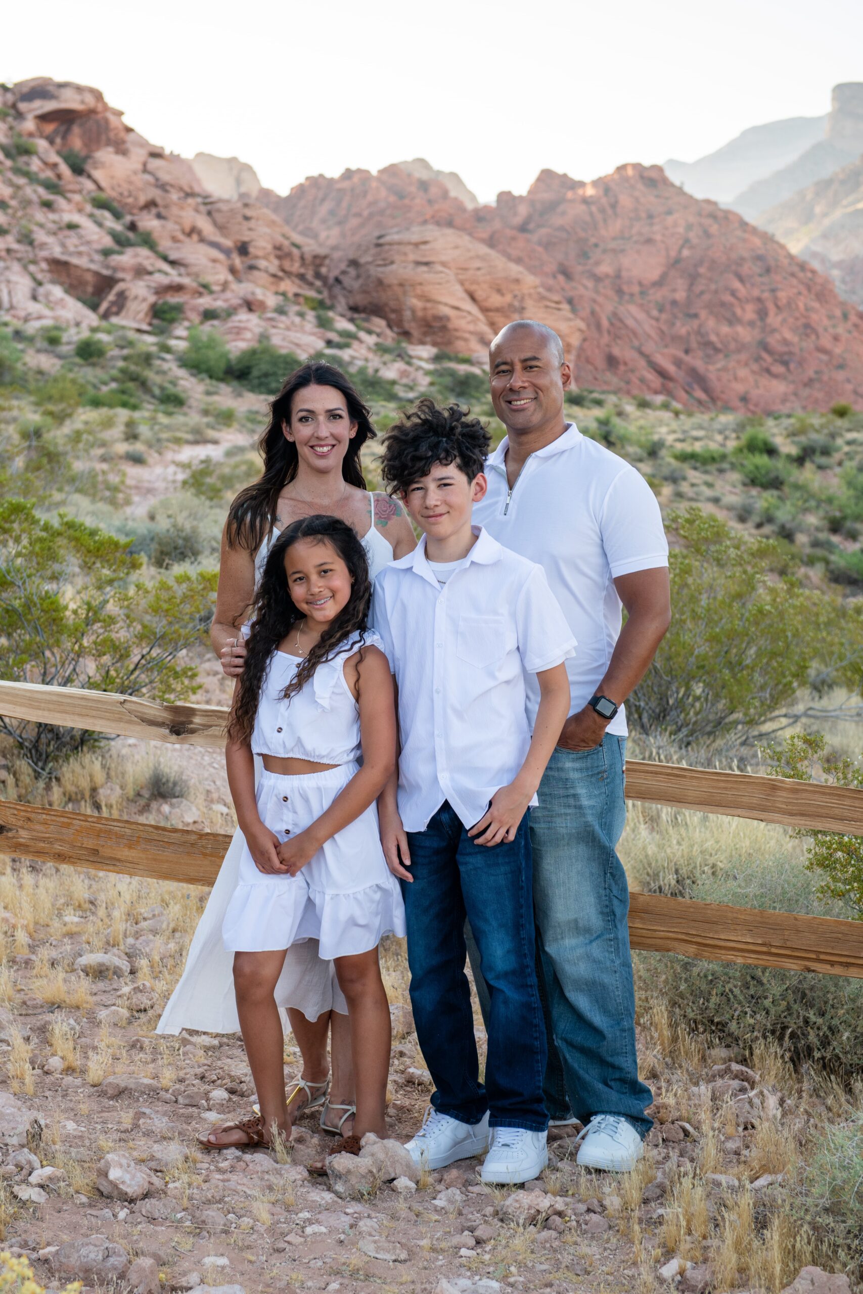 Family of four during an outdoor session with a DFW family photographer